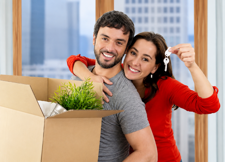 Young couple excited to buy a home