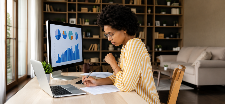Woman looking at data on a computer