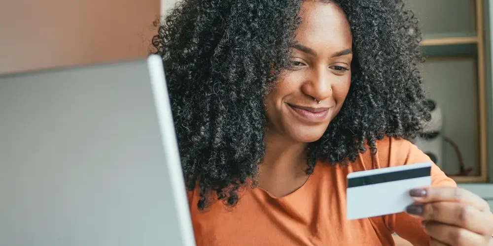 Person reviewing financial information on a device